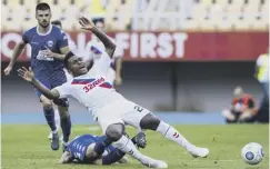  ??  ?? 0 Rangers’ Alfredo Morelos feels the full force of a Shkupi challenge.