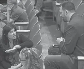  ?? MARK HENLE/THE REPUBLIC ?? Beth Lewis speaks with David Schapira during a protest of the voucher vote on Monday night in the Arizona House. The controvers­ial school-funding plan merits robust debate.