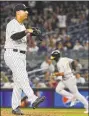  ?? Frank Franklin II / Associated Press ?? Yankees relief pitcher Nestor Cortes Jr. reacts as Oakland’s Marcus Semien runs the bases after hitting a home run in the ninth inning on Friday.