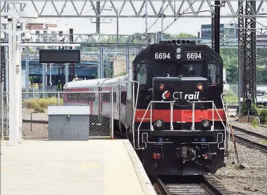  ??  ?? A CTrail Hartford Line train leaves Union Station in New Haven on July 26.