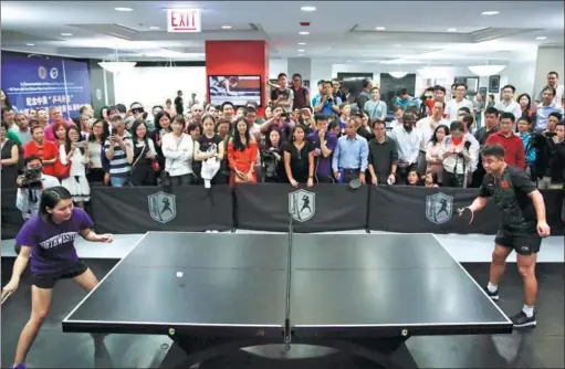  ?? PHOTOS BY WANG PING / XINHUA ?? Wang Hao (right), a world ping-pong champion, played an exhibition match recently in Chicago. Wang Hao,