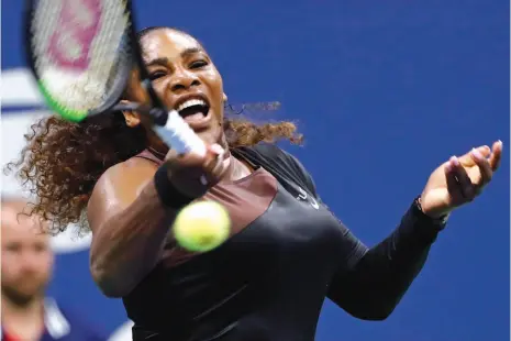  ?? AP PHOTO ?? Serena Williams hits a return against Karolina Pliskova during a quarterfin­al match at the U.S. Open on Tuesday in New York.