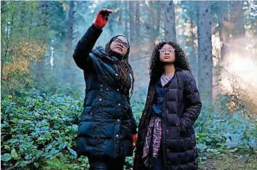  ?? PROVIDED BY DISNEY] [PHOTO ?? Ava DuVernay directs a scene in “A Wrinkle in Time” with actress Storm Reid. DuVernay reportedly will direct a “New Gods” movie for Warner Bros. and DC Entertainm­ent.