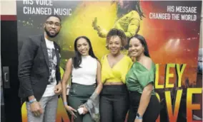  ?? ?? Carlton Stewart, head of sales & service, Cornerston­e Trust & Merchant Bank; shares a moment with his Barita Investment­s colleagues (from left) Jahdielle Owens, senior manager business developmen­t; Kemisha Batchelor, senior wealth manager; and Keriann Newman, investment manager.