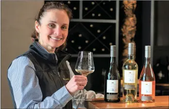  ?? Photo contribute­d ?? Mission Hill Family Estates chief winemaker Corrie Krehbiel shows off the West Kelowna winery’s first three Reserve releases of the 2020 vintage, Pinot Gris, Sauvignon Blanc and Rose.