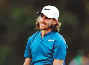  ?? AP ?? Tommy Fleetwood reacts after playing a shot on the 11th fairway during the final round of 2017 Nedbank Golf Challenge at the Gary Player Country Club in Sun City on Sunday.
