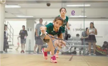  ?? — AFP ?? Syrian team-mates of Squash Dreamers play on a court during the Hong Kong Junior Squash Tournament.