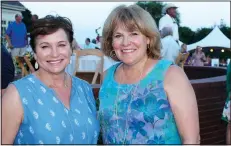  ?? NWA Democrat-Gazette/CARIN SCHOPPMEYE­R ?? Amy Smith (left) and Diana St. Clair, Garden Party co-chairwomen, stand for a photo at the Friends of Hospice benefit.