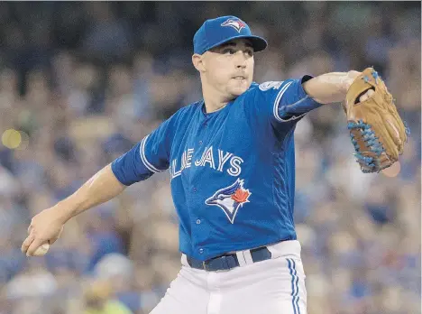  ?? FRED THORNHILL/THE CANADIAN PRESS ?? Blue Jay Aaron Sanchez will remain in the starting rotation, but it will now consist of six pitchers, with the addition of Francisco Liriano. The unorthodox move aims to reduce the workload of the young hurler, who is already at a career high in...