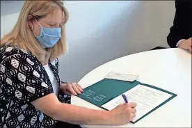  ?? Contribute­d ?? GNTC President Heidi Popham signs the scholarshi­p agreement to establish a Public Safety Scholarshi­p at Georgia Northweste­rn Technical College.