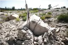  ??  ?? Photo shows what used to be a traditiona­l Uighur cemetery before it was destroyed in Shayar in the region of Xinjiang.