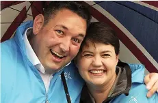  ??  ?? Upbeat: Ruth Davidson and the Tory Edinburgh South West candidate Miles Briggs campaignin­g yesterday
