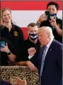  ?? (AP/Matt York) ?? President Donald Trump acknowledg­es supporters at the Yuma, Ariz., Internatio­nal Airport after his speech Tuesday.