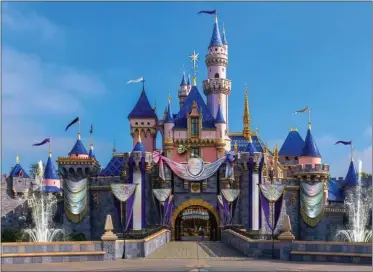  ?? PHOTOS COURTESY OF DISNEY ?? A rendering shows how the color scheme will extend to theme park features like Sleeping Beauty Castle at Disneyland.