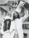  ?? ASSOCIATED PRESS ?? John Lennon waves his marriage certificat­e with bride Yoko Ono after their wedding on March 20, 1969.