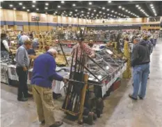  ?? STAFF FILE PHOTO ?? Booths fill the main exhibit hall at last year’s Chickamaug­a Civil War Show at the Dalton Convention Center.