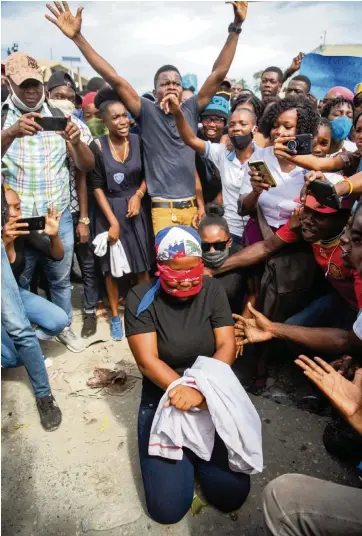  ?? DIEU NALIO CHERY AP ?? A protester acts out the kidnapping of Sincère in Port-au-Prince, Haiti, on Thursday.