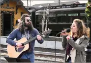  ?? ?? Justin Fava and Stephanie Grace perform Country Pop music at the Rail Yard during the Beary Loved: A Valentine’s Stroll Through Boyertown event Feb. 12.