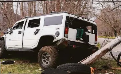  ?? Waterbury Police Department / Contribute­d photo ?? A crashed Hummer in Monroe that police said was involved in a car chase across town lines that left seven police officers injured. The driver, 25-year-old Hannah Casperson, is facing charges that include assaulting an officer.