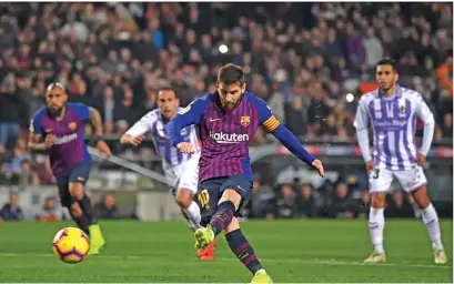  ?? Photo: Evening Standard. ?? Barcelona’s Lionel Messi scoring against Real Valladolid in the La Liga on February 17, 2019.