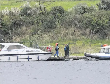  ??  ?? Police and emergency services at the scene of the boating tragedy on Devenish Island in April