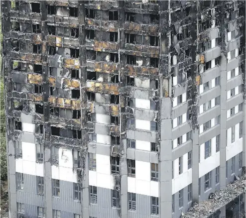  ?? FRANK AUGSTEIN / THE ASSOCIATED PRESS ?? “We are looking at every criminal offence from manslaught­er onwards,” London police said Friday about the apartment tower inferno that killed at least 79 people.