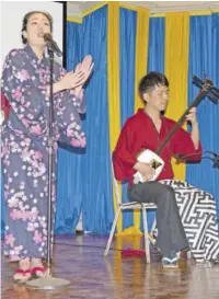  ?? (Photo: Rory Daley) ?? Akari Mochizuki (left) and Hibiki Ichikawa in performanc­e at the Shamisen & Japanese Folk Music Concert.