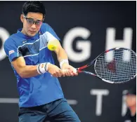  ??  ?? Hiroki Moriya of Japan returns a shot in the Mens Singles final against James Ward of Great Britain. Photo by Tony Marshall/Getty Images for LTA)