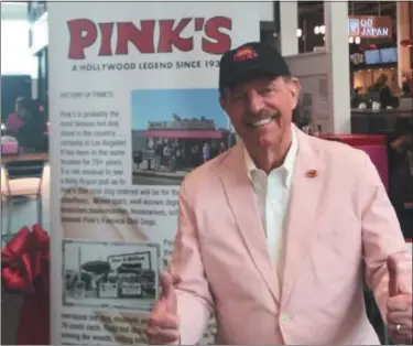  ?? GARY PULEO — MEDIANEWS GROUP ?? Richard Pink, owner of Pink’s hot dogs, was on hand for Friday’s opening of Pink’s at King of Prussia Mall.