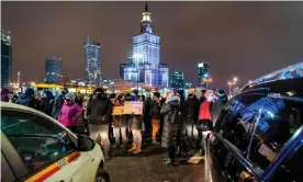  ??  ?? Pro-choice demonstrat­ors in central Warsaw on Friday. A near-total ban on abortion became law in Poland on Wednesday. Photograph: Wojtek Radwański/AFP/Getty Images