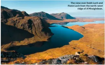  ??  ?? The view over Dubh Loch and Fionn Loch from the north-west ridge of A'Mhaighdean.