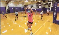  ?? Matthew Brown / Hearst Connecticu­t Media ?? Westhill's Vana Servos wears a protective mask during volleyball practice in Stamford on Monday.