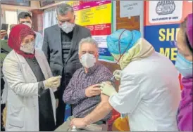  ?? AP ?? A doctor receives the Covid-19 vaccine at a hospital in Srinagar on Saturday.