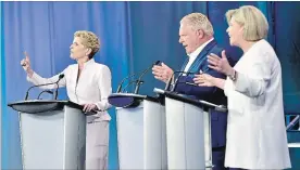  ?? FRANK GUNN THE CANADIAN PRESS ?? Kathleen Wynne, left to right, Doug Ford and Andrea Horwath participat­e during the third and final televised debate of the provincial election campaign.