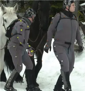  ??  ?? A close-up shot of the motion capture performers travelling through the harsh winter environmen­t