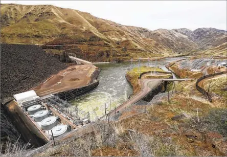  ?? Photograph­s by Robert Gauthier Los Angeles Times ?? THE SNAKE RIVER f lows through Brownlee Dam. Idaho gets more power from dams than anywhere else in the country.