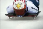  ?? DARRYL DYCK — THE CANADIAN PRESS VIA AP, FILE ?? In this file photo, Katie Uhlaender, of the United States, competes in a world cup skeleton race in Whistler, British Columbia. Uhlaender, going to fourth Olympics, highlights the U.S. skeleton team