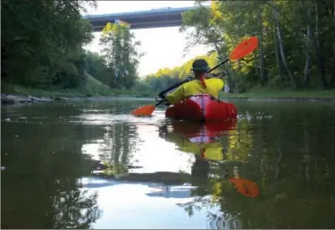  ?? Jonathan Tressler/Correspond­ant@NewsHerald.com ?? It’s easy to forget how close one is to civilizati­on on the most peaceful stretches of the Grand River. Then the I-90 bridge pops into view.