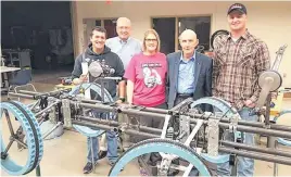  ??  ?? Retired Gen. Thomas P. Stafford and the Southwest Oklahoma State University rover team show off the rover.