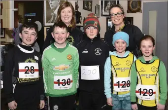  ??  ?? Denise Gilmartin and Louise Kilbane with some of the South Sligo AC Junior athletes.