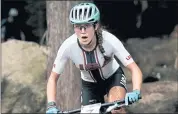  ?? THIBAULT CAMUS — THE ASSOCIATED PRESS ?? Team USA’s Kate Courtney finished out of medal contention in the cross-country mountain bike competitio­n in Izu, Japan.