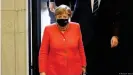  ??  ?? Merkel was wearing a mask when she walked into the Bundesrat on Friday