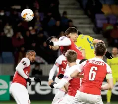  ?? AP ?? BATE’s Stanislav Dragun, top right, scores the match-winning goal for his side.