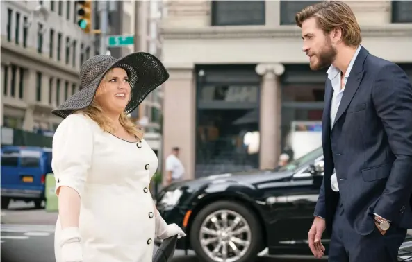  ?? PHOTOS: WARNER BROS. ?? Rebel Wilson, left, stars in Isn’t It Romantic alongside Liam Hemsworth, who proves he isn’t the only Hemsworth brother with a sense of humour.