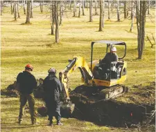  ?? JEAN LEVAC FILES ?? Police officers dig near the former home of Camille Cleroux in November 2011.