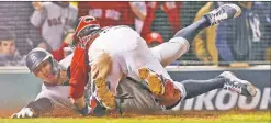  ?? N.Y. Post: Charles Wenzelberg ?? NEVIN & HELL: Aaron Judge is tagged out by Red Sox catcher Kevin Plawecki after a questionab­le decision by third-base coach Phil Nevin to send him home.