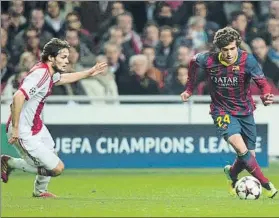  ?? FOTO: CHAVES ?? Blind y Sergi Roberto, en 2013 Solo el Ajax iguala cinco titulares de casa del Barça