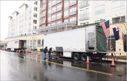  ?? Tyler Sizemore / Hearst Connecticu­t Media ?? Large trucks line the street where "The Good Nurse" is being filmed Thursday in Stamford