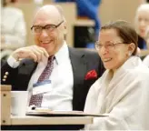  ?? ED BAILEY/AP FILES ?? Supreme Court Justice Ruth Bader Ginsburg laughs with her husband, Martin, in 2003 at Columbia Law School.