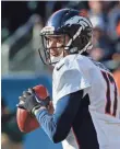  ?? KAMIL KRZACZYNSK­I, USA TODAY SPORTS ?? Brock Osweiler, above, filling in for Peyton Manning, helped the Broncos win Sunday.